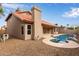 Backyard pool area with desert landscaping at 4129 E Nighthawk Way, Phoenix, AZ 85048