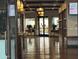Interior view of the Ahwatukee Recreation Center, featuring a wooden floor and pendant lights at 4325 E Sacaton St, Phoenix, AZ 85044