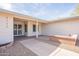 Home exterior showcasing a front porch with a walkway and a small brick flowerbed at 4325 E Sacaton St, Phoenix, AZ 85044