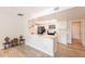 Bright kitchen with white cabinets, black appliances and a breakfast bar at 4325 E Sacaton St, Phoenix, AZ 85044