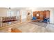 View of the living room and dining room with light wood floors at 4325 E Sacaton St, Phoenix, AZ 85044