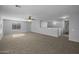 Upstairs living room with a ceiling fan, and light, open feel at 43646 W Elizabeth Ave, Maricopa, AZ 85138