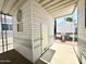Inviting carport area of the mobile home with convenient access and ample space at 455 S Jaspar Dr, Apache Junction, AZ 85119