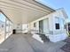 Welcoming mobile home showcasing a covered carport providing lots of space at 455 S Jaspar Dr, Apache Junction, AZ 85119