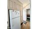 Kitchen with full size refrigerator at 455 S Jaspar Dr, Apache Junction, AZ 85119