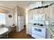 Well-equipped kitchen featuring modern appliances and wooden cabinets at 455 S Jaspar Dr, Apache Junction, AZ 85119