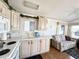 Bright kitchen with white appliances and ample counter space at 455 S Jaspar Dr, Apache Junction, AZ 85119