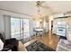 Open floor plan with views of the kitchen, dining area, and wood floors at 455 S Jaspar Dr, Apache Junction, AZ 85119