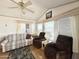Comfortable living room offering natural light, ceiling fan and cozy furniture at 455 S Jaspar Dr, Apache Junction, AZ 85119