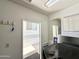 Attached storage area featuring durable floors, bright lighting, and smooth access at 455 S Jaspar Dr, Apache Junction, AZ 85119