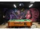 Game room featuring a pool table and custom mural for ultimate entertainment at 4713 W Kelton Ln, Glendale, AZ 85306