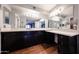 Spacious bathroom with double vanity, quartz countertop, and dark wood cabinetry, offering ample storage at 4916 E Hopi St, Phoenix, AZ 85044