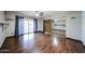 Bedroom with wood floors and a large closet with mirrored doors for ample storage at 4916 E Hopi St, Phoenix, AZ 85044