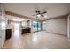 Open-concept living area with tile floors seamlessly connects the kitchen and living spaces at 4916 E Hopi St, Phoenix, AZ 85044