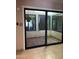 Large sliding glass doors showcase the outdoor patio, providing seamless indoor-outdoor living at 4916 E Hopi St, Phoenix, AZ 85044