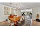 Elegant dining room with modern chandelier, hardwood floors, and spacious layout at 5112 N 41St St, Phoenix, AZ 85018