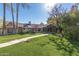 Charming single-story home with well-manicured lawn and mature trees at 5112 N 41St St, Phoenix, AZ 85018