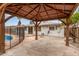 View of a backyard with a fenced pool and a covered patio area at 5525 N 21St Ave, Phoenix, AZ 85015