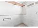 Painted basement wall with storage and a high window for natural light at 5525 N 21St Ave, Phoenix, AZ 85015