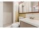 Tiled bathroom featuring a shower and vanity at 5525 N 21St Ave, Phoenix, AZ 85015