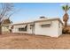 View of single story home with neutral desert landscaping and awnings on the windows at 5525 N 21St Ave, Phoenix, AZ 85015