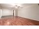 Spacious living room with hardwood floors, ceiling fan, and inviting atmosphere at 5525 N 21St Ave, Phoenix, AZ 85015