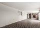 Bright living room with a brick fireplace and geometric patterned tile floor at 5525 N 21St Ave, Phoenix, AZ 85015