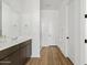 Modern bathroom featuring sleek cabinetry, and a glass enclosed shower at 5650 S Feliz --, Mesa, AZ 85212