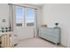 Bright bedroom features a charming dresser, natural light, and soothing decor, creating a peaceful ambiance at 5650 S Feliz --, Mesa, AZ 85212