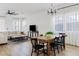 Open-concept living and dining area with natural light and neutral decor at 5650 S Feliz --, Mesa, AZ 85212