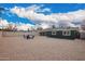 Spacious backyard with fire pit and covered patio at 6119 N 18Th Dr, Phoenix, AZ 85015