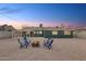 Backyard with fire pit, seating, and covered patio at 6119 N 18Th Dr, Phoenix, AZ 85015