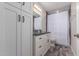 Bathroom with a shower-tub combo, dark granite counters, drawers, and cabinet storage at 6119 N 18Th Dr, Phoenix, AZ 85015