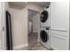 Stacked washer and dryer in the laundry area at 6119 N 18Th Dr, Phoenix, AZ 85015