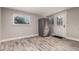 Mud room with stainless steel refrigerator, and exterior access at 6119 N 18Th Dr, Phoenix, AZ 85015