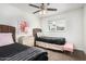 Bright and airy bedroom with twin beds, decorative artwork, and neutral decor at 6943 E Granada Rd, Scottsdale, AZ 85257