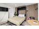 Modern bedroom with a murphy bed, stylish slat wall, and a sleek, minimalist design at 6943 E Granada Rd, Scottsdale, AZ 85257
