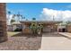 Charming single-story home with a desert landscape, covered carport, and inviting curb appeal at 6943 E Granada Rd, Scottsdale, AZ 85257