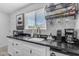 Charming kitchen with modern appliances, sleek countertops, and ample natural light at 6943 E Granada Rd, Scottsdale, AZ 85257
