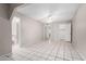 Spacious bedroom featuring tile flooring and ample closet space for storage at 7017 W Beatrice St, Phoenix, AZ 85043