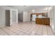Open kitchen area featuring classic appliances and a large window for natural light at 7017 W Beatrice St, Phoenix, AZ 85043