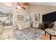 Spacious living room with vaulted ceilings, contemporary furnishings, and lots of natural light at 7920 E Via Camello -- # 48, Scottsdale, AZ 85258