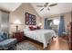 Spacious main bedroom with high ceilings, ceiling fan and sliding glass door to patio at 7920 E Via Camello -- # 48, Scottsdale, AZ 85258