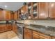 Kitchen featuring stainless steel appliances, granite countertops, and abundant cabinet space at 8761 W Mary Ann Dr, Peoria, AZ 85382