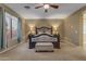 Inviting bedroom features stylish decor, including a large window and a comfortable bench at 8761 W Mary Ann Dr, Peoria, AZ 85382