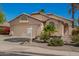 Inviting home showcasing desert landscaping, a two-car garage, and easy access at 9922 E Onza Ave, Mesa, AZ 85212