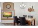 Elegant dining area with modern lighting and entertainment center at 10401 N Saguaro Blvd # 130, Fountain Hills, AZ 85268