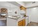 Well-lit kitchen with white appliances and adjacent dining area at 10401 N Saguaro Blvd # 130, Fountain Hills, AZ 85268