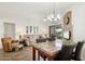 Open-concept living room showcasing natural light and dining area at 10401 N Saguaro Blvd # 130, Fountain Hills, AZ 85268