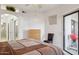 Spacious main bedroom with sliding door and a bathroom across the hall at 10401 N Saguaro Blvd # 130, Fountain Hills, AZ 85268